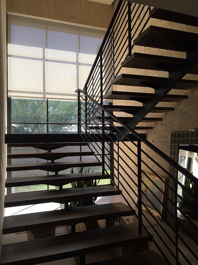 Grand Staircase — Wrought Iron & Wood